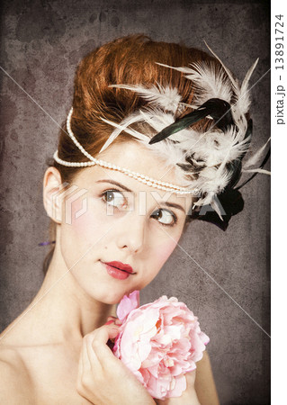 Redhead girl with Rococo hair style and flower at vintage backgr 13891724