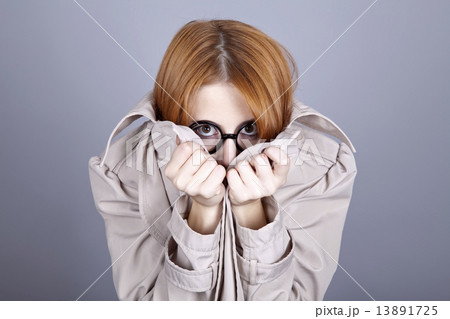 Hiding red-haired girl in glasses and cloak. 13891725