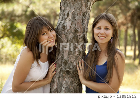 Two happy sisters at the park. 13891815