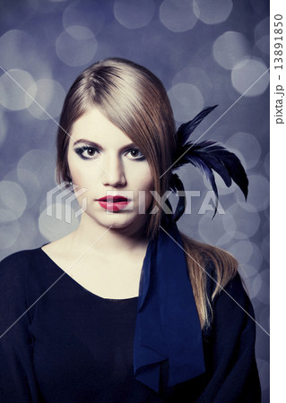 Portrait of beautiful girl with bokeh at background. 13891850