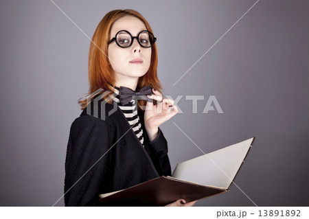 Portrait of vogue girl with glasses and jacket. Portrait of vogue girl with glasses and jacket. 13891892