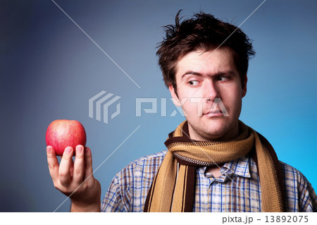 Funny men with apple. 13892075