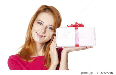 Beautiful red-haired girl with present box Beautiful red-haired girl with present box 13892540