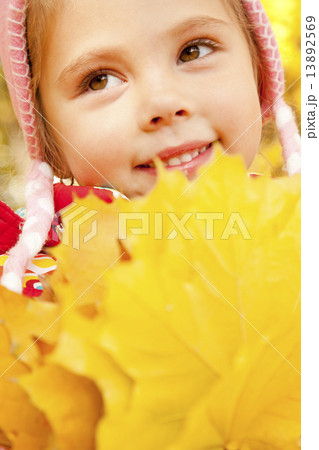 Child in autumn park. Child in autumn park. 13892569