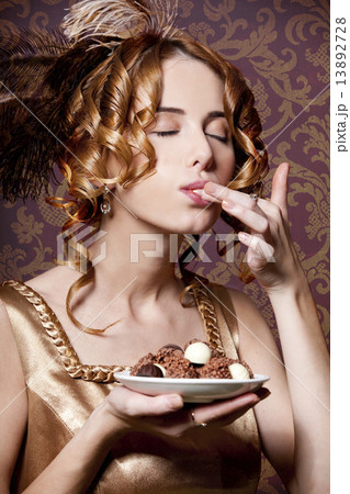 Empire girl with candy. 13892728