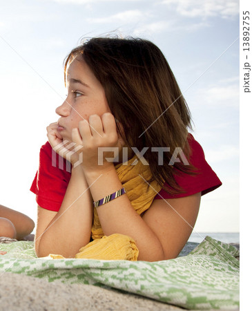 Funny teen girl at beach 13892755