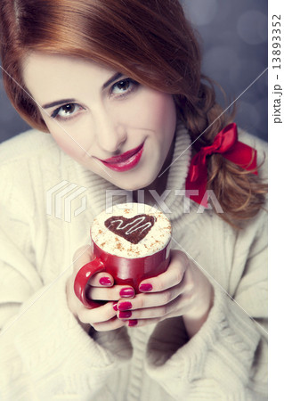 Redhead girl with red coffee cup at. St. Valentine's Day 13893352