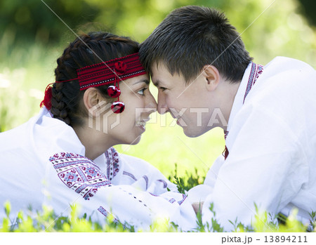 Slav girl and young cossack at nature. 13894211