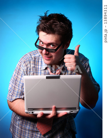 Boy with notebook show OK 13894311