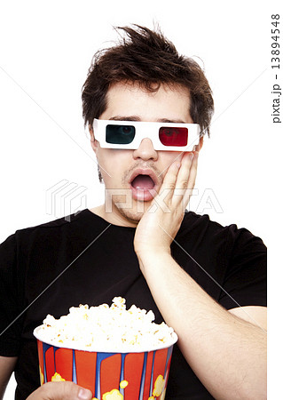 Funny men in stereo glasses with popcorn. Funny men in stereo glasses with popcorn. 13894548