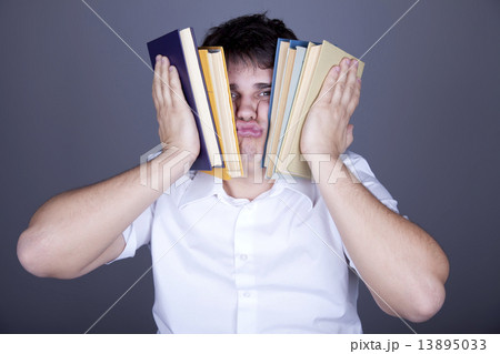 Tired men with books. 13895033