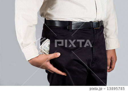 Man with abundant of money in his pocket Man with abundant of money in his pocket 13895785