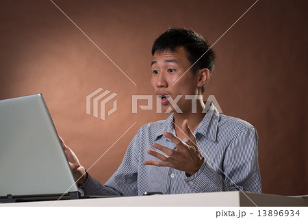 Surprised Chinese business man 13896934