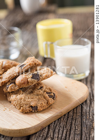 Stack of Chocolate chip cookie and glass of milk Stack of Chocolate chip cookie and glass of milk 13901281