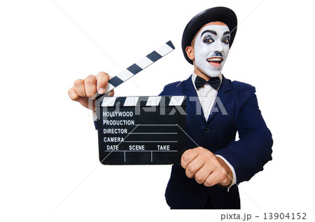 Man with movie clapper isolated on white 13904152