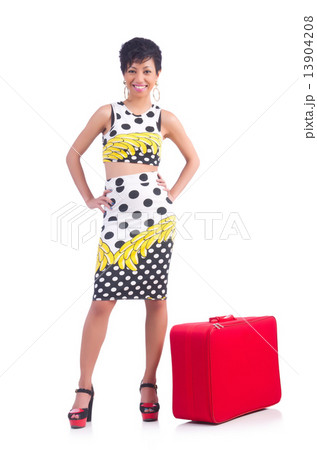Young woman preparing for vacation Young woman preparing for vacation 13904208