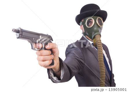 Businessman wearing gas mask isolated on white 13905001