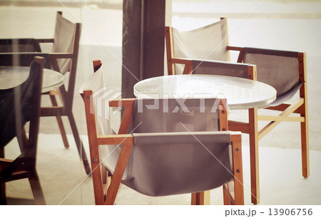 Modern wood chair in the garden with retro filter effect 13906756