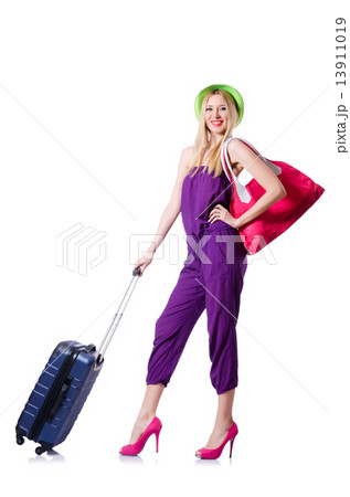 Young woman with suitcase on white 13911019