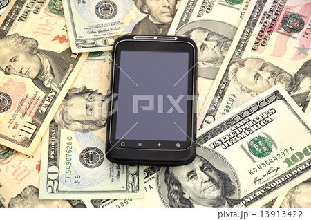 touchscreen mobile phone and dollars touchscreen mobile phone and dollars 13913422