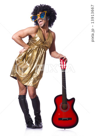 Man in woman clothing with guitar Man in woman clothing with guitar 13913667
