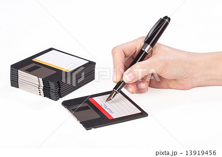female hand signs floppy disk 13919456