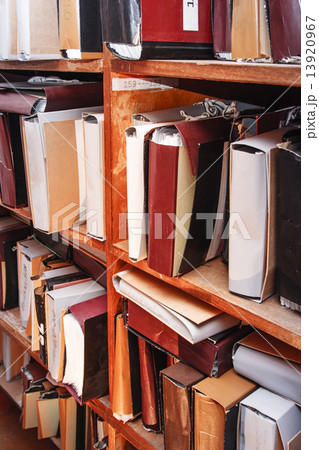 Paper documents stacked in archive Paper documents stacked in archive 13920967