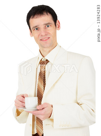 Young business man with cup of tea Young business man with cup of tea 13924283