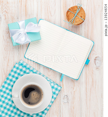 Cup of coffee, gingerbread cookies gift box and notepad 13924654