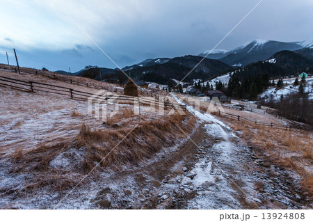 Fantastic evening winter landscape. Dramatic overcast sky. 13924808