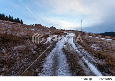 Fantastic evening winter landscape. Dramatic overcast sky. 13924809