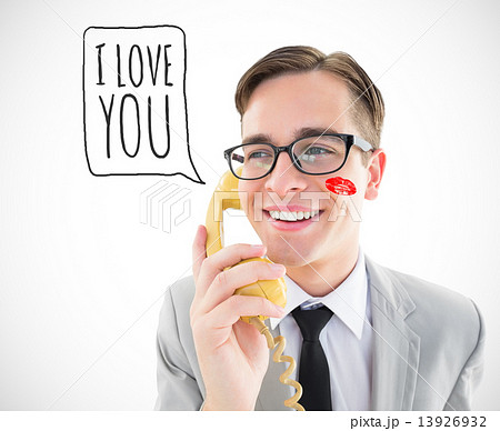 Composite image of geeky businessman talking on retro phone Composite image of geeky businessman talking on retro phone 13926932