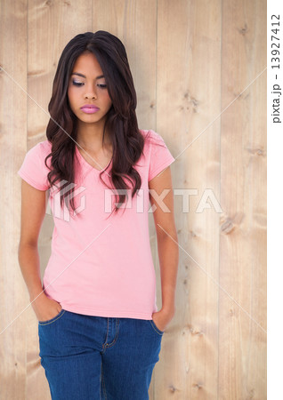 Composite image of pretty brunette stepping Composite image of pretty brunette stepping 13927412