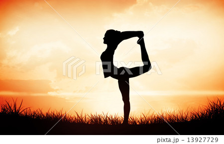 Composite image of sporty woman stretching body while balancing 13927729