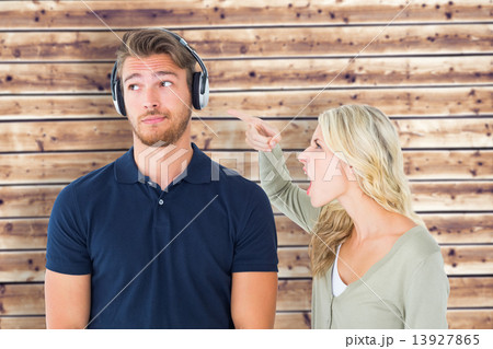 Composite image of young couple having an argument Composite image of young couple having an argument 13927865