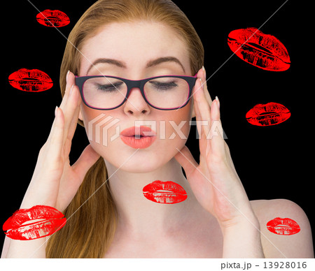 Composite image of beautiful redhead posing with glasses Composite image of beautiful redhead posing with glasses 13928016