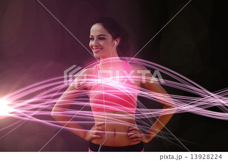 Composite image of beautiful smiling healthy with earphones on b Composite image of beautiful smiling healthy with earphones on b 13928224