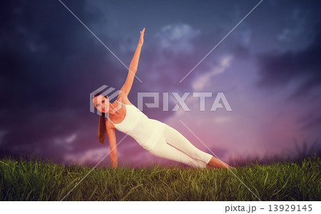 Composite image of fit woman doing pilate exercises in the fitne 13929145
