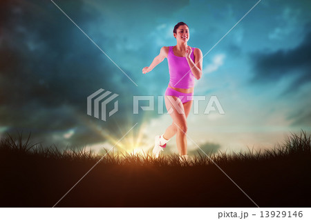 Composite image of fit brunette running and jumping Composite image of fit brunette running and jumping 13929146