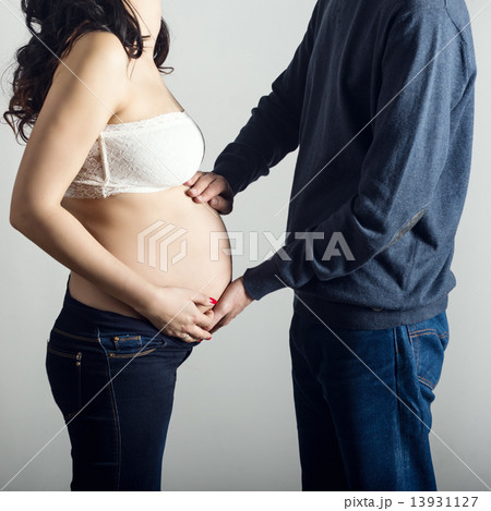 Pregnant mother and happy father 13931127