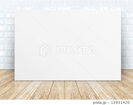 Poster frame at tiles ceramic wall and wooden floor 13931420