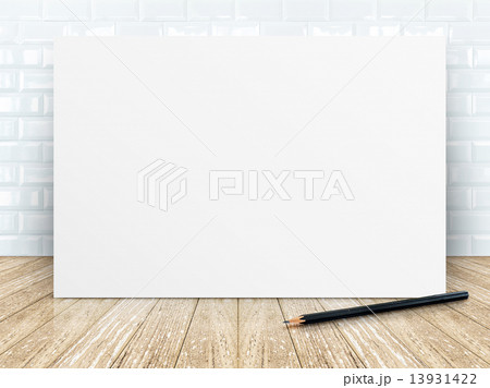 Poster frame at tiles ceramic wall and wooden floor Poster frame at tiles ceramic wall and wooden floor 13931422