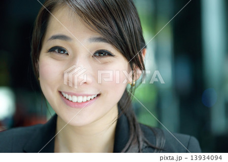 Portrait of one young successful Chinese businesswoman  13934094