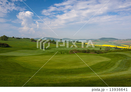 On the golf course on the hills 13936641