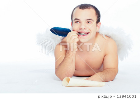 Little angel man with wings writing a letter 13941001