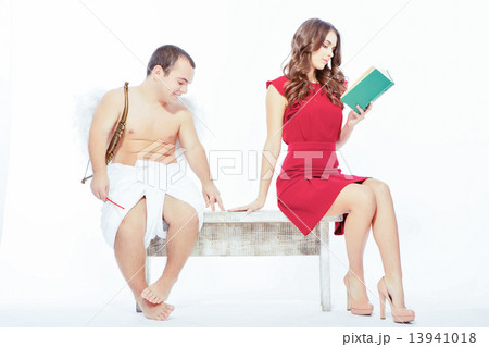 Little angel with white wings and romantic woman Little angel with white wings and romantic woman 13941018