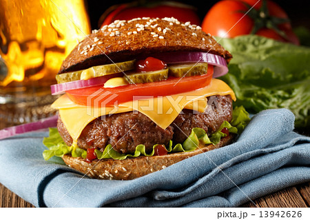 Burger with beer close up. Burger with beer close up. 13942626