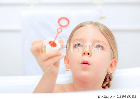 Cute little girl in the bathroom  13943083