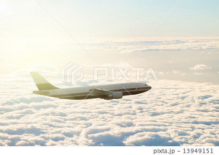 plane over clouds plane over clouds 13949151