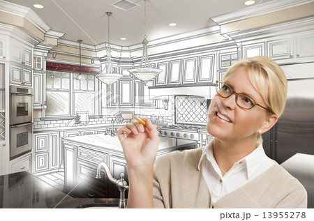 Woman With Pencil Over Custom Kitchen Design Drawing and Photo C Woman With Pencil Over Custom Kitchen Design Drawing and Photo C 13955278